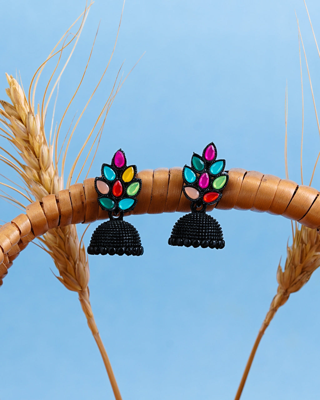Bold Bloom Black Jhumka Earrings with Multicolor Leaf Stones